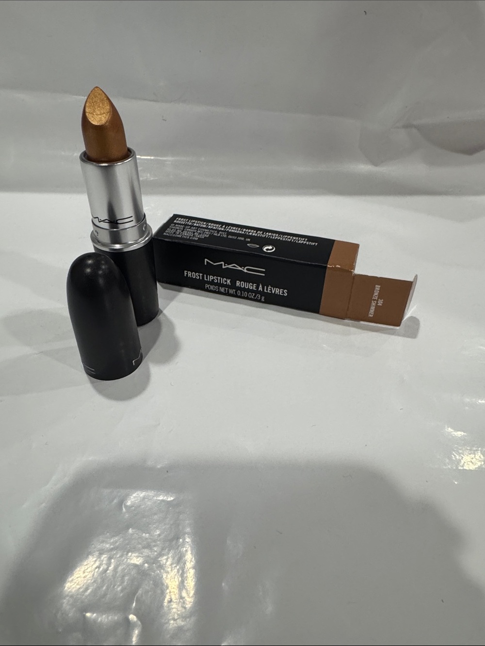 MAC Cosmetics Frost Lipstick in Metallic Gold-Bronze 304 bronze shimmer